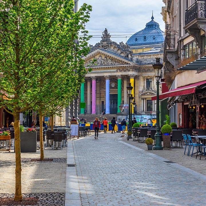 Old street with tables of cafe in center of Brussels, Belgium